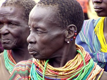 This picture of a woman of the Karamojong Tribe from Northeastern Uganda in traditional native dress was taken by Brent Earwicker of Bend, Oregon.